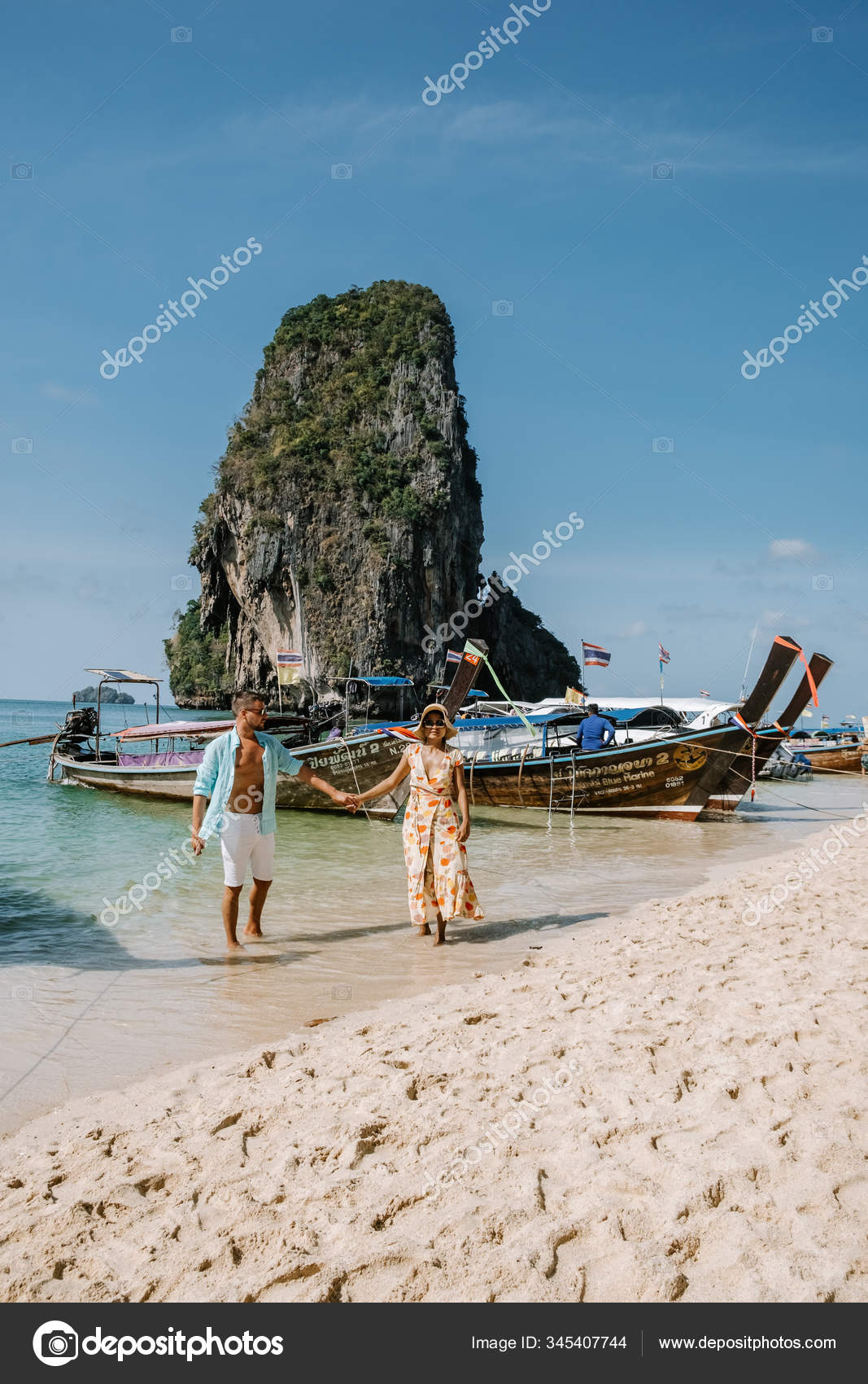 Railay Beach Krabi Thailand, a couple of men and woman on the