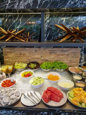 Breakfast buffet in luxury hotel in Thailand, fresh fruit and bread at buffet styl breakfast in hotel