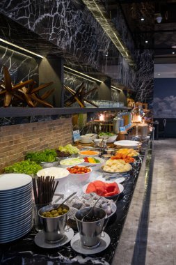 Breakfast buffet in luxury hotel in Thailand, fresh fruit and bread at buffet styl breakfast in hotel