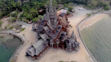 Skyline of Pattaya Thailand with wooden old historical temple during sunset Pattaya Thailand