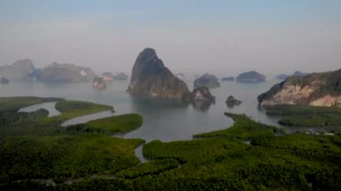 Aerial view over Phangnga Bay Thailand Phangnga, drone view over the lagoon during sunset Sameth Nang She viewpoint flying over lagoon