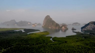 Aerial view over Phangnga Bay Thailand Phangnga, drone view over the lagoon during sunset Sameth Nang She viewpoint flying over lagoon