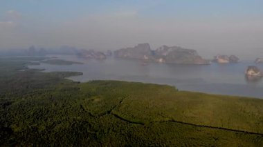 Aerial view over Phangnga Bay Thailand Phangnga, drone view over the lagoon during sunset Sameth Nang She viewpoint flying over lagoon