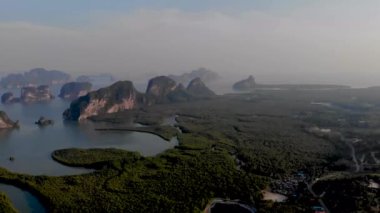 Aerial view over Phangnga Bay Thailand Phangnga, drone view over the lagoon during sunset Sameth Nang She viewpoint flying over lagoon