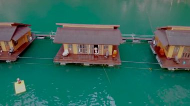 Khao Sok, Thailand January 2020, Raft houses on the Khao Sok National Park Lake in Thailand. This is popular form of accommodation for tourists and locals