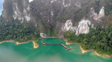 Khao Sok, Thailand , Raft houses on the Khao Sok National Park Lake in Thailand. This is popular form of accommodation for tourists and locals