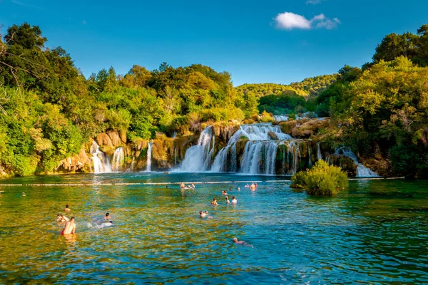 KRKA waterfalls Croatia September , krka national park Croatia on a bright summer evening with people relaxing in the water — Stock Fotó