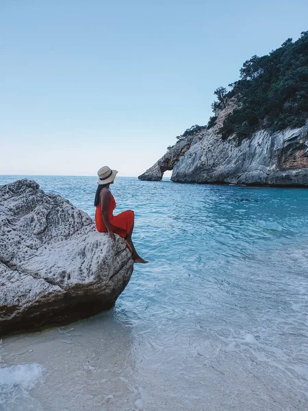 Sardinia Orosei coast Italy, woman on vacation at the Island of Sardinia on a boat trip to all the white pebble beaches some of the most beautiful beaches in Europe — 스톡 사진