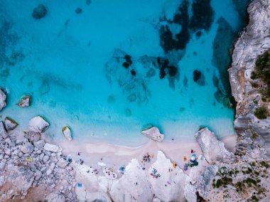 Sardinia Orosei coast Italy, people snorkling in the crystal clear ocean of Sardinia Italy