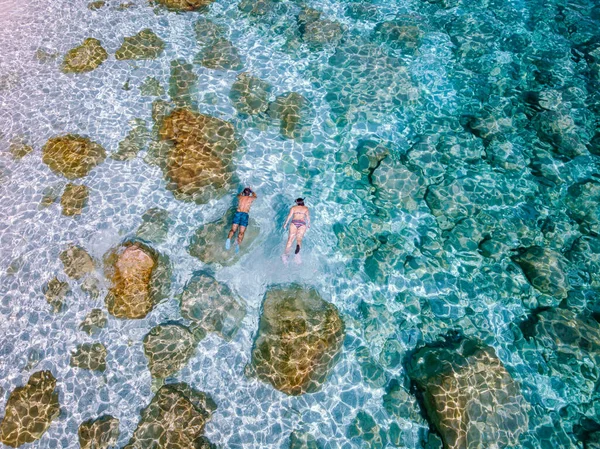 Sardinia Orosei coast Italy, people snorkling in the crystal clear ocean of Sardinia Italy — Stok fotoğraf
