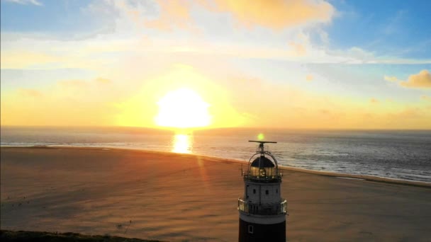 Günbatımında Teksaslı deniz feneri Hollanda Hollanda Adası Tekeli — Stok video