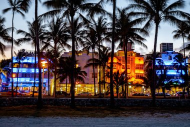 Miami Beach, colorful Art Deco District at night Miami Florida clipart
