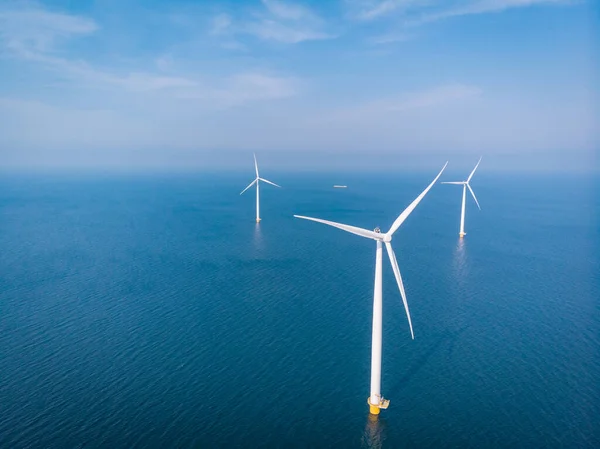 Wind turbine from aerial view, Drone view at windpark westermeerdijk a windmill farm in the lake IJsselmeer the biggest in the Netherlands,Sustainable development, renewable energy — Stock Photo, Image