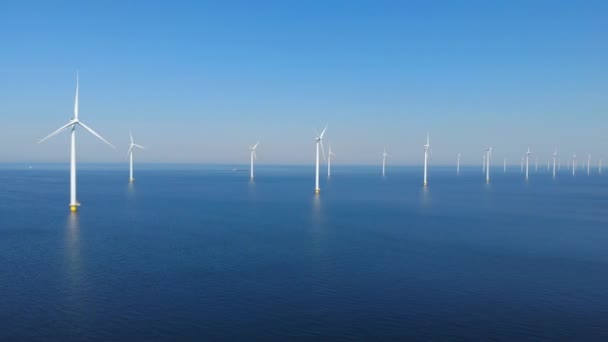 Turbina wiatrowa z lotu ptaka, Widok drona na park wiatrowy Westermeerdijk farma wiatraków w jeziorze IJsselmeer największy w Holandii, Zrównoważony rozwój, Energia odnawialna — Wideo stockowe