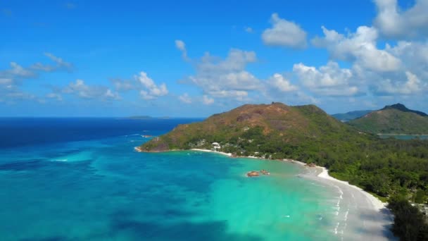 Panorama drone view over the island Praslin, bird eye view panoramic tropical island with crystal clear water Praslin Seychelles — Stock Video