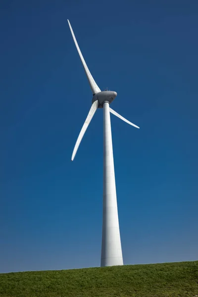 Offshore Windmill farm in the ocean Westermeerwind park , windmills isolated at sea on a beautiful bright day Netherlands Flevoland Noordoostpolder