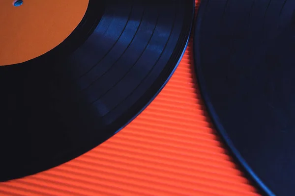 Two Black Vinyls Arranged Red Background Top View — Stock Photo, Image