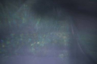 Açık arkaplanda farklı renkte apsdtracte ışıkları olan desen