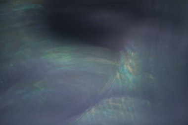 Açık arkaplanda farklı renkte apsdtracte ışıkları olan desen