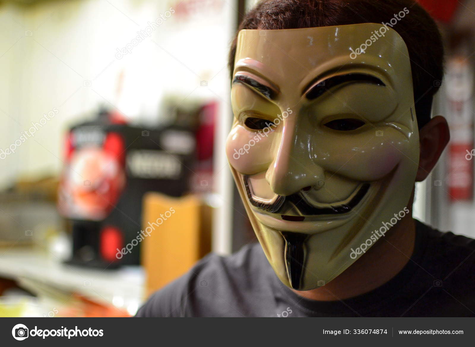 Man Wears A V For Vendetta Guy Fawkes Mask Stock Photo - Download