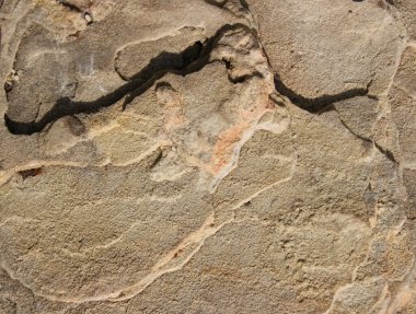 Kusursuz doku. Taş bir duvarın eski hali. Arka plan için taş duvarın bir kısmı şehirli. Grunge Dokusu