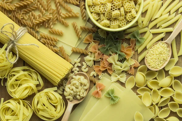 Close up on assortment of uncooked pasta — Stock Photo, Image