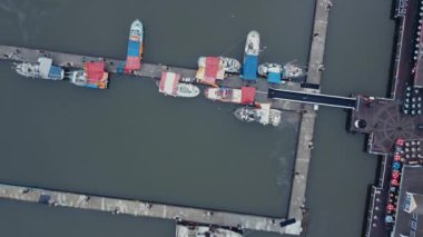 Top down view of fish market, where fishermen selling fish from their boats