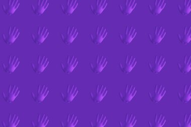 Arka planda tıbbi bir eldiven.