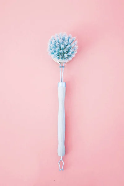 Eco brush on the pink background with blue hairs — Stock Photo, Image