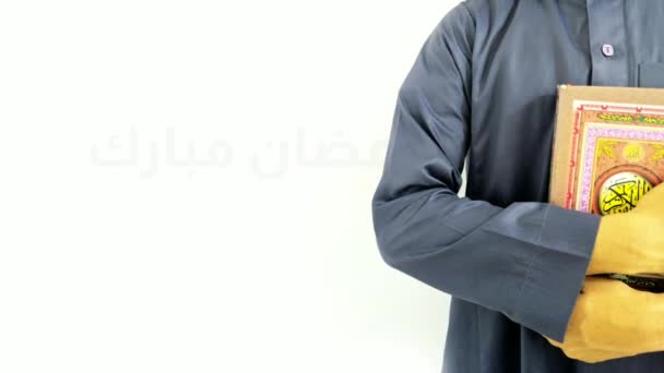 Ramadan Greeting Cards Man Holding Quran Background — Stock Video