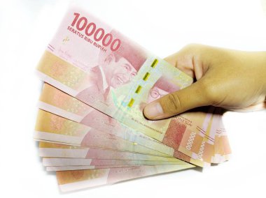 Kebumen. Merkezi Java. Endonezya 'da. 22 Mayıs 2020. Idul fitri ya da İşçi Maaşı sırasında THR (Tatil Ödeneği) için Endonezya parası