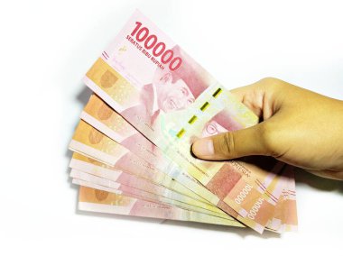 Kebumen. Merkezi Java. Endonezya 'da. 22 Mayıs 2020. Idul fitri ya da İşçi Maaşı sırasında THR (Tatil Ödeneği) için Endonezya parası