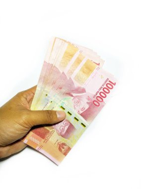 Kebumen. Merkezi Java. Endonezya 'da. 22 Mayıs 2020. Idul fitri ya da İşçi Maaşı sırasında THR (Tatil Ödeneği) için Endonezya parası