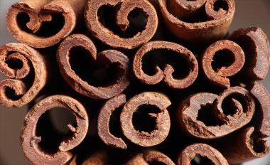 Yiyecek arka planı için tarçın çubukları desenli bir demet fotoğrafçılık