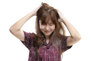 Asyalı kadın baş ve mutluluk tırmalamak