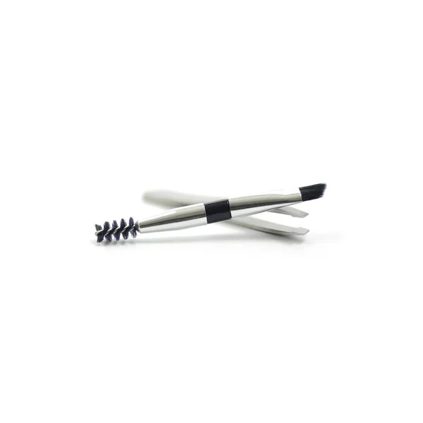 Cosmetic set : spoolie brush, tweezers, angled brush isolate on — Stock Photo, Image