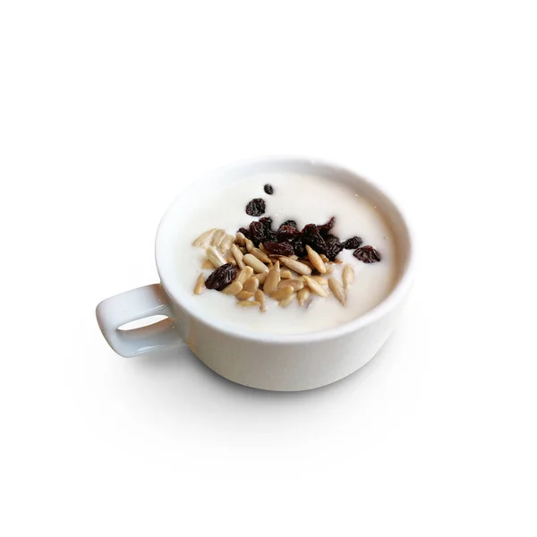 Mushroom creamsoup with raisin and sunflower seeds topping isola Stock Picture