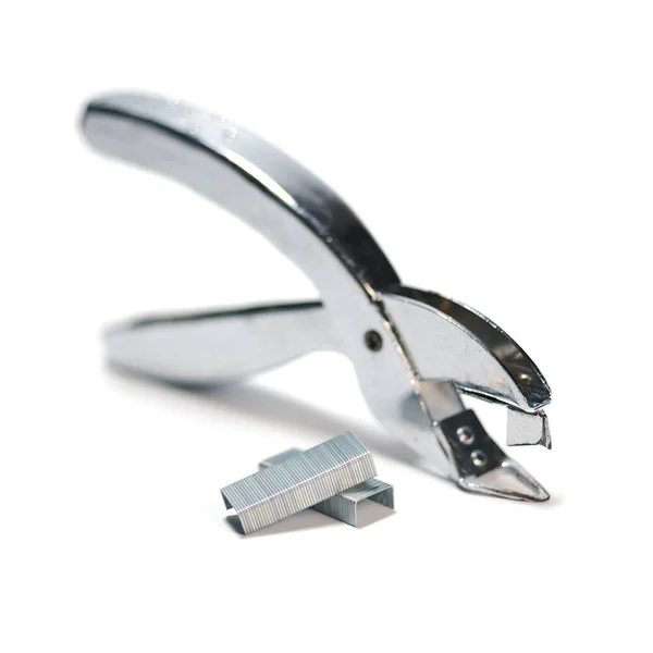 Staple remover and staples isolate on white background — Stock Photo, Image