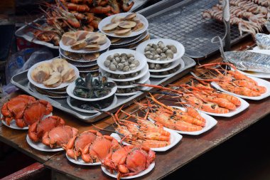 Fresh seafood market sale on shelt  clipart