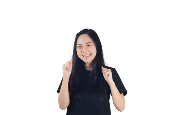 Веселая молодая азиатская женщина смотрит вверх с руками на для удовольствия и — стоковое фото