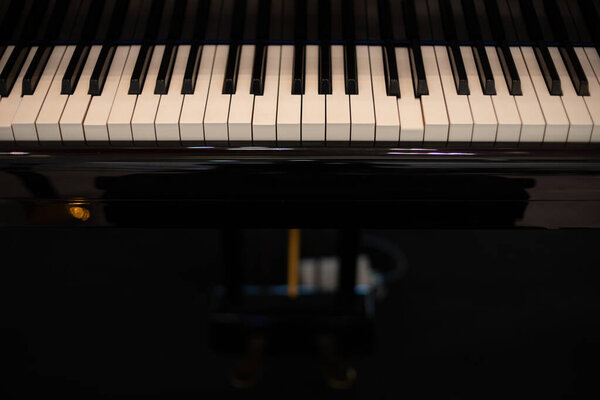 Black Piano and Piano keyboard as music and entertainment backgr