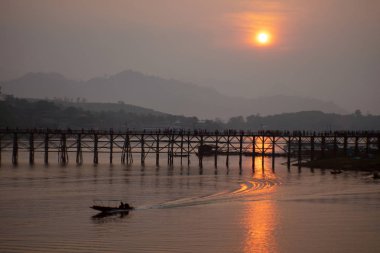 Ancient mon wooden bridge in songgaria river Sangkhla Buri Distr
