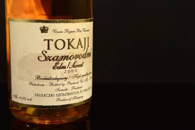 Bottle of Tokaj wine. This renowned wines from Hungary was also popular in the French royal court and the other monarchs of Europe -  illustrative editorial clipart