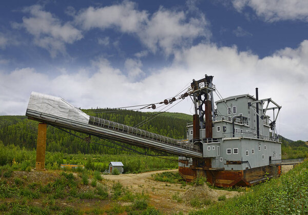 Dredge No 4 is a National Historic Site on Bonanza Creek Road, the largest wooden hull dredge in the world,  Yukon Territory, Canada. Klondike gold rush