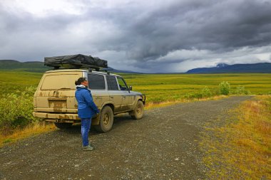 truck in the countryside of a road,  Tombstone Park, Yukon, Canada