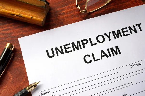 Unemployment claim form on an office table. — Stock Photo, Image