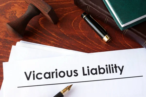 Papers with title Vicarious Liability on a table. — Stock Photo, Image