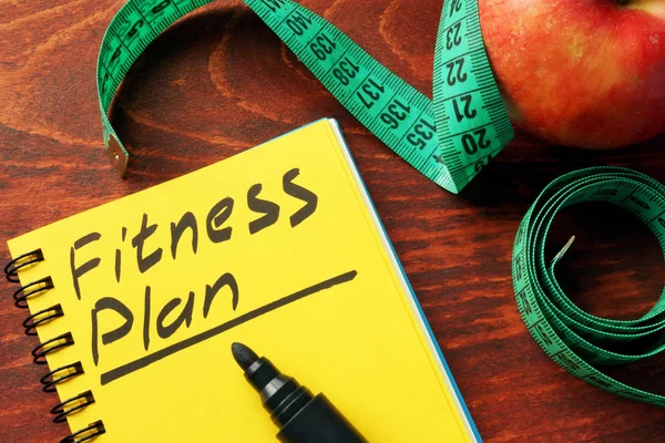 Plan fitness napisane w notatce. Pojęcie zdrowego stylu życia. — Zdjęcie stockowe