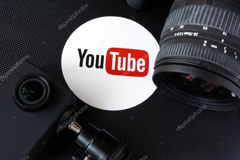 KYIV, UKRAINE - December 07, 2016: Youtube logo on a box and  cameras. Video blog concept.