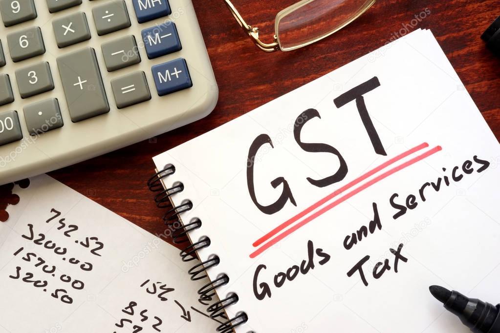 The goods and services tax  (GST) written in a note.